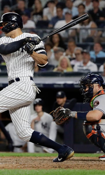 Yanks get key hits off Astros' gloves for 8th straight win